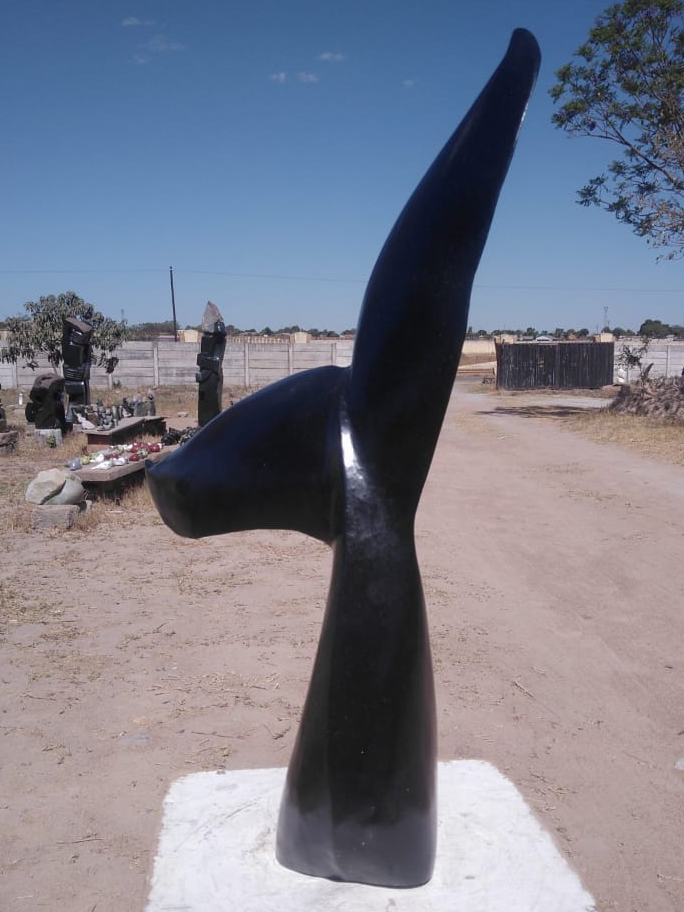 Whale Tail - Stone Sculpture Made of Springstone by Tinashe Chidawu | Zimbabwe