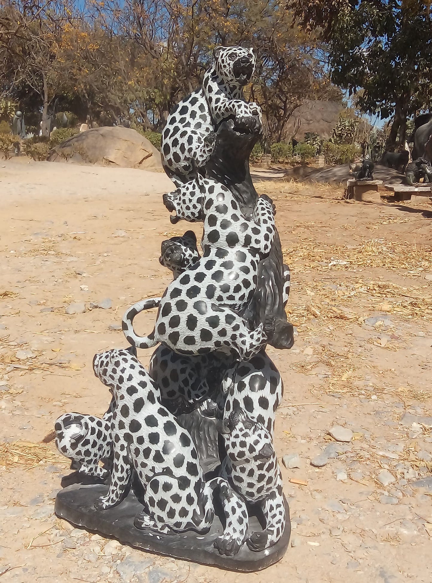 Leap of Leopards - Stone Sculpture Made of Green Opal Stone by Gideon Masendeke | Zimbabwe