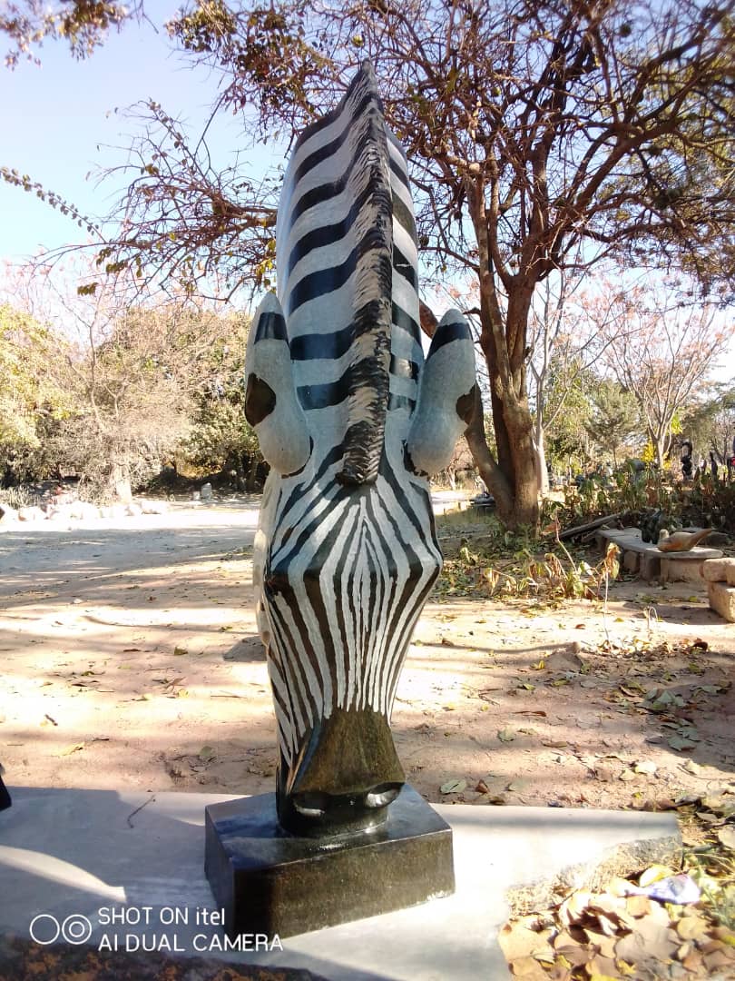Drinking Zebra - Stone Sculpture Made of Springstone by Teremayi Maisiri | Zimbabwe