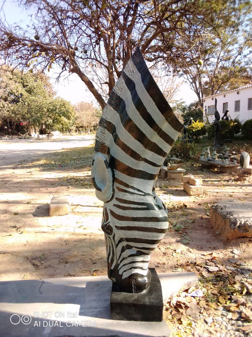 Drinking Zebra - Stone Sculpture Made of Springstone by Teremayi Maisiri | Zimbabwe