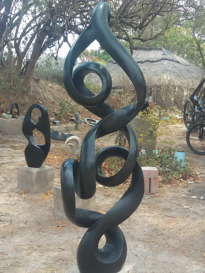 Whirlwind - Stone Sculpture Made of Springstone by Tafadzwa Zisengwe | Zimbabwe