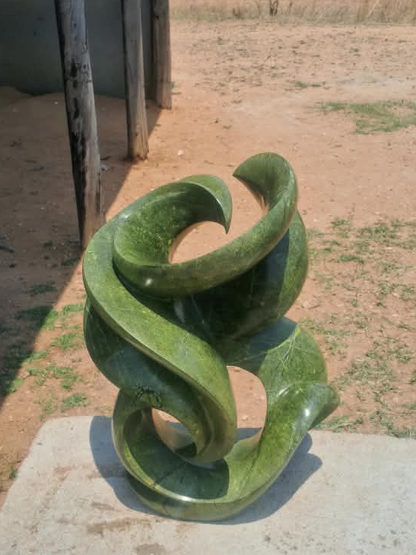 Blooming Flower - Stone Sculpture Made of Avocado Stone by James Phiri | Zimbabwe