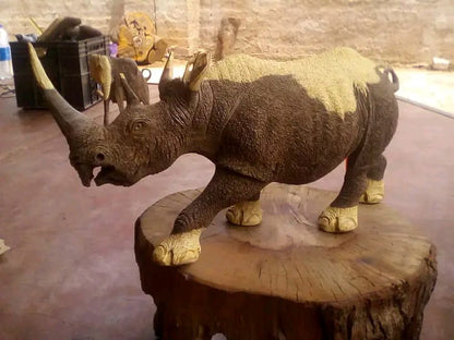 Rhino Carvings Collection : Carved from Ironwood by Killian Torovasei | Zimbabwe