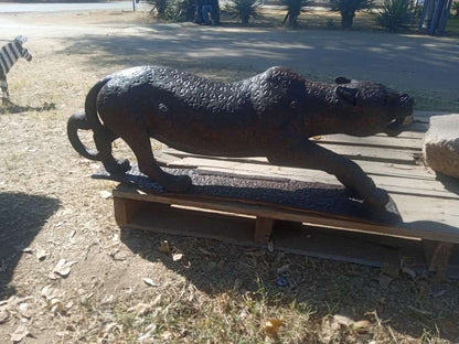 Leopard Collection - Carved from Ironwood by Killian Torovasei | Zimbabwe