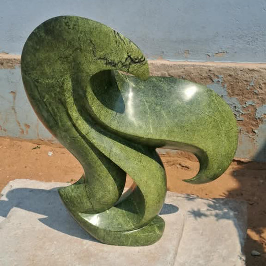 Green Repose - Stone Sculpture Made of Avocado Stone by James Phiri | Zimbabwe