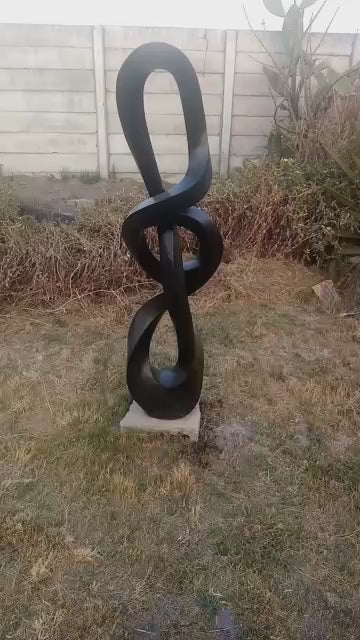 Silent Strength - Stone Sculpture Made of Springstone by Blessng Mutukwa | Zimbabwe